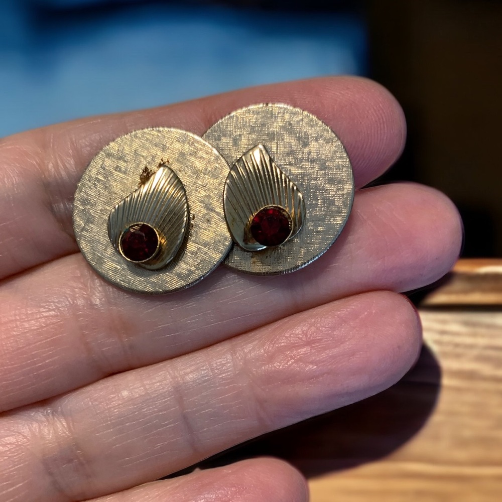 Vintage cuff links. Gold tone with ruby colored glass stone